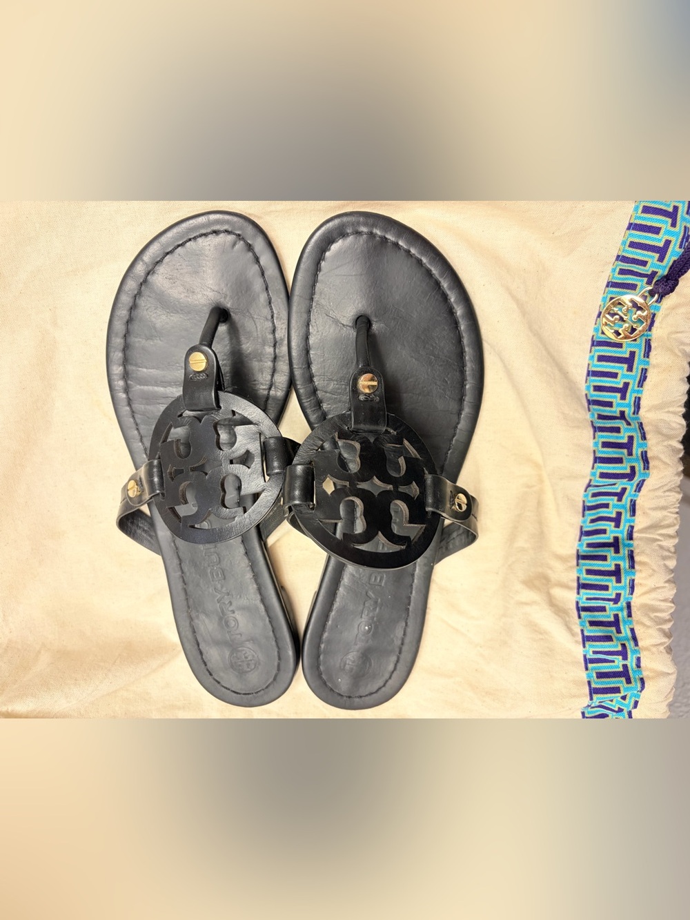 Tory Burch Black Leather Logo Thong Sandals with Gold Accents - Picture 2 of 3